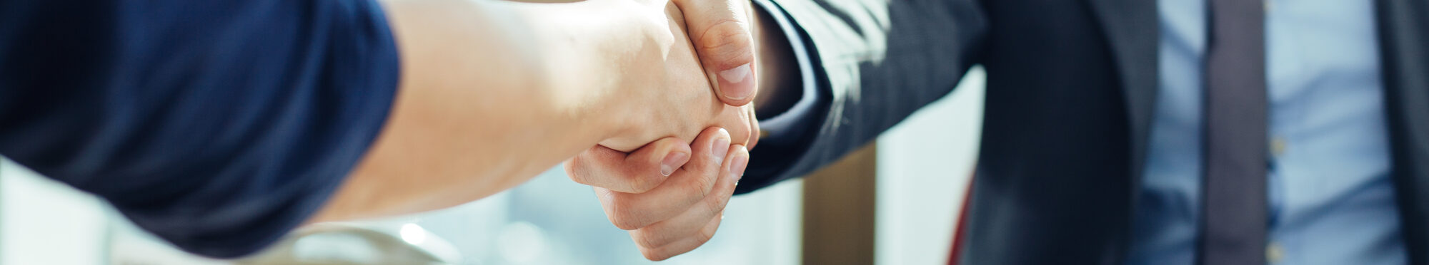 Close up of business handshake in the office